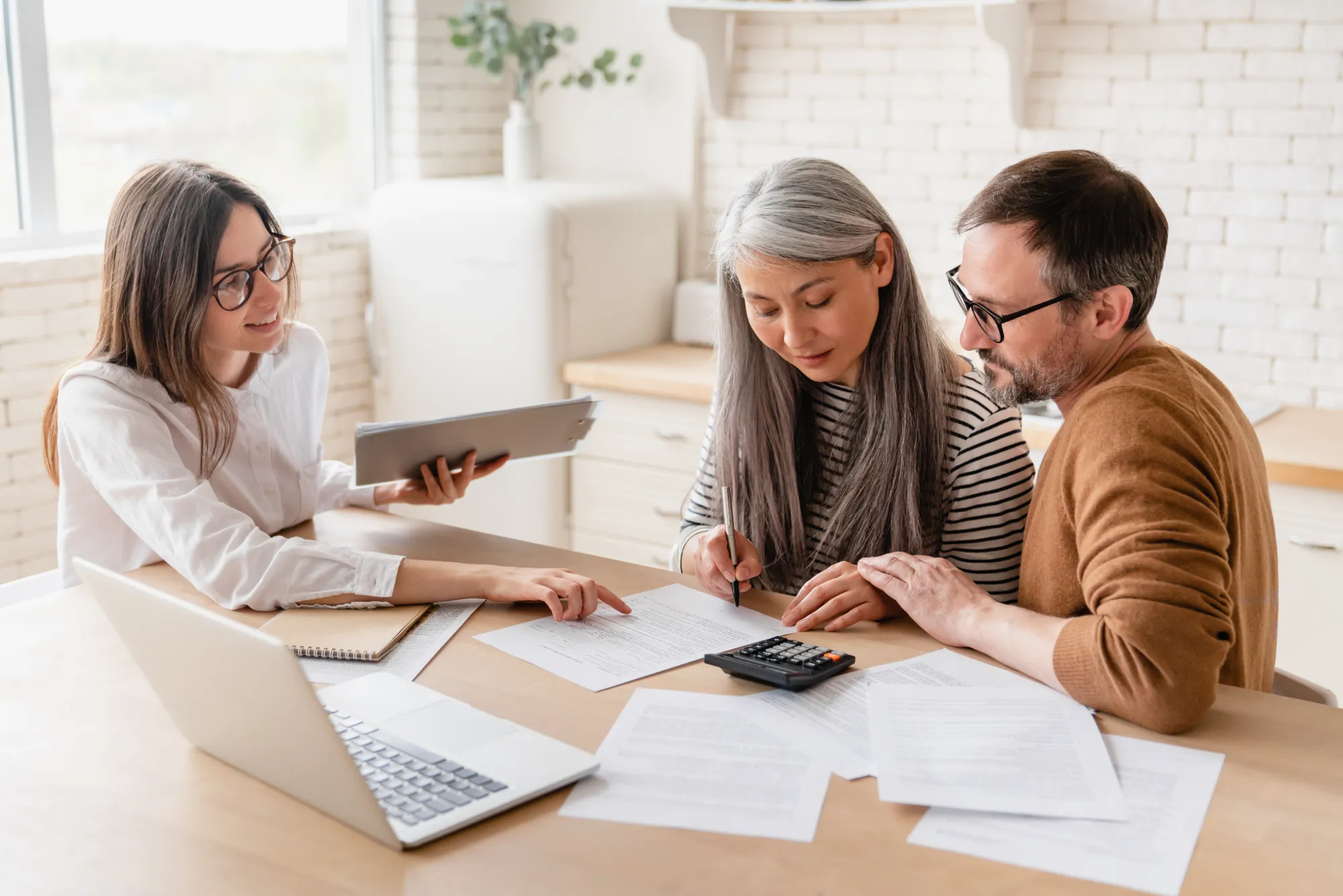 Lending team reviewing loan details together
